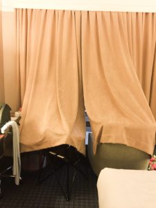 Makeshift room out of curtains in hotel